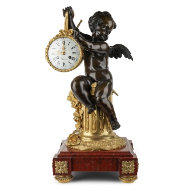 Каминные часы «Амур, бьющий в гонг»
